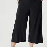 The Bradley Culotte in Charcoal is the ultimate combination of style, comfort, and practicality for your workwear wardrobe. Available in sizes 8-24 and 2 leg lengths. Petite Model wears a size 10.