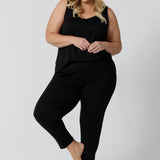 A good loungewear pant for curvy women, these comfortable tapered leg lounge pants make great pyjama pants. Worn with black bamboo cami top, this is a breathable, thermo-regulating pyjama set and makes get sleepwear for night sweats and hot flushes. Shop loungewear sets online at L&F Australia.