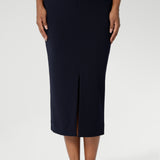 Navy workwear skirt is made of easy to care fabric in scuba crepe fabric. Workwear skirt has a deep navy colour. This comfortable work wear skirt provides full body stretch great for any office or corporate setting. Australia made clothing. Made by Australian and New Zealand women. Leina and Fleur is a woman’s fashion label that stocks sizes from 8 to 24. Shop this appropriate work skirt in plus size and petite sizes.