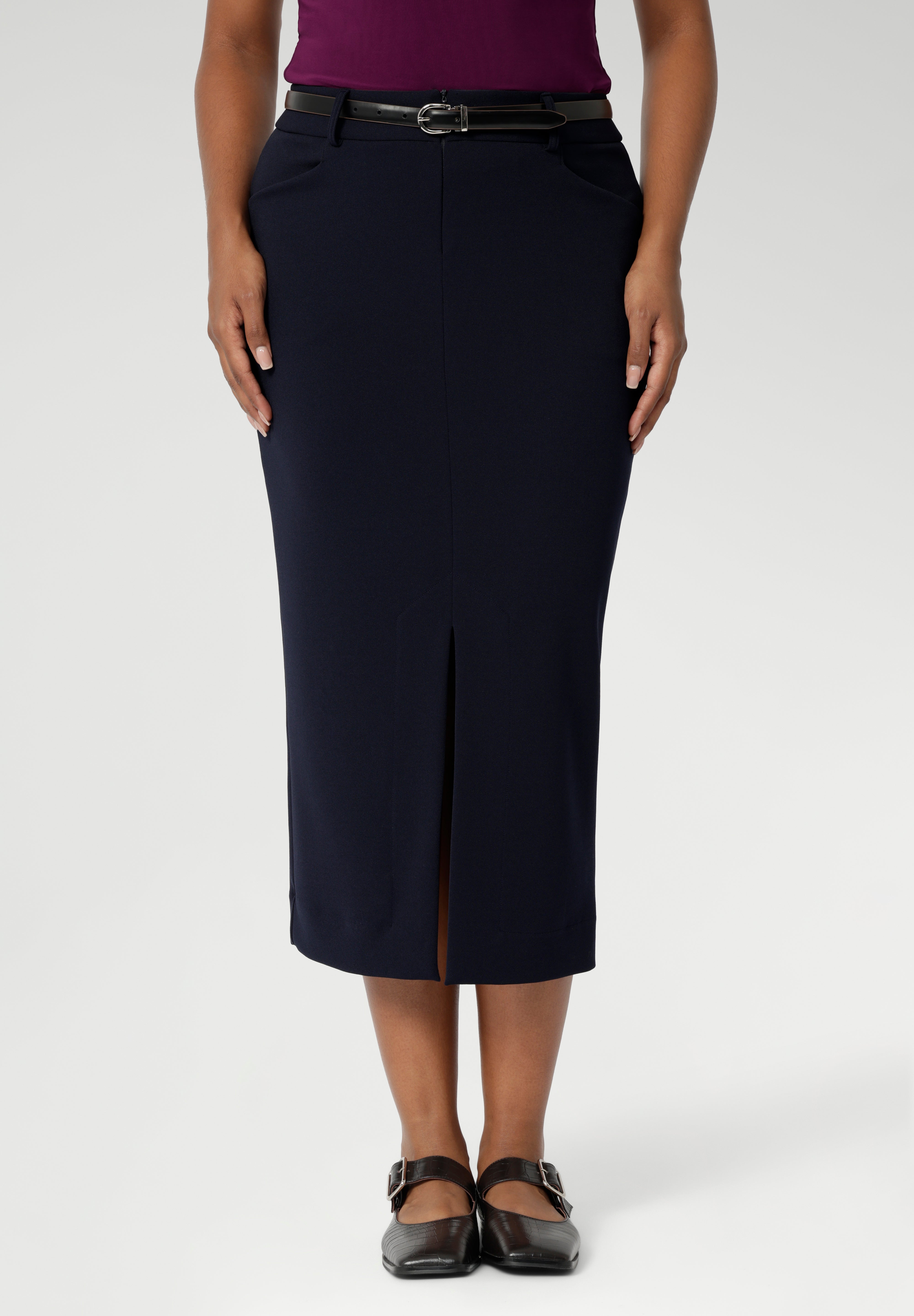 Navy workwear skirt is made of easy to care fabric in scuba crepe fabric. Workwear skirt has a deep navy colour. This comfortable work wear skirt provides full body stretch great for any office or corporate setting. Australia made clothing. Made by Australian and New Zealand women. Leina and Fleur is a woman’s fashion label that stocks sizes from 8 to 24. Shop this appropriate work skirt in plus size and petite sizes.