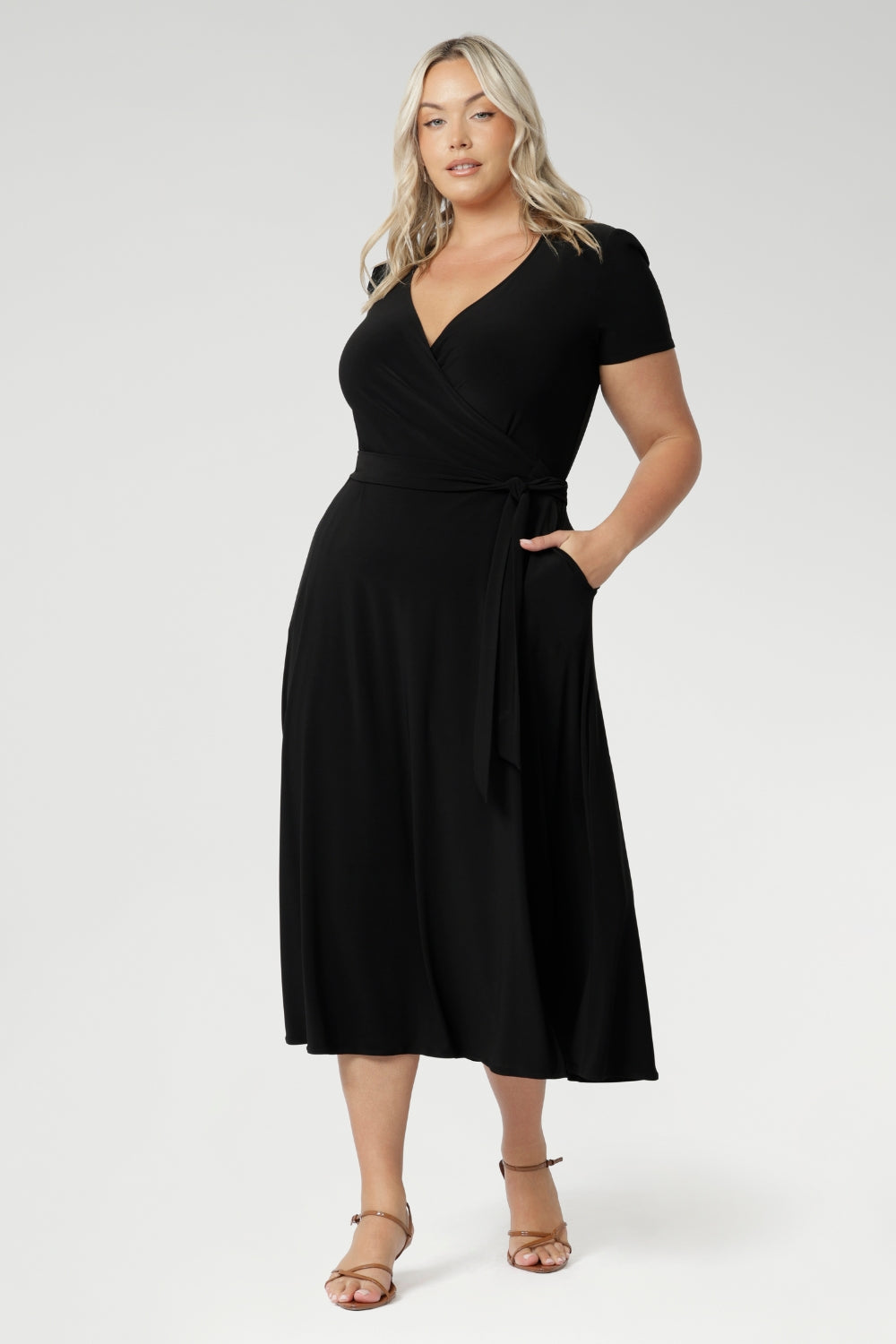Available in sizes 8-24, the Alexis dress is the perfect plus-size wrap dress for women looking for a flattering, functional, and fashionable option.
