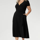 Available in sizes 8-24, the Alexis dress is the perfect plus-size wrap dress for women looking for a flattering, functional, and fashionable option.