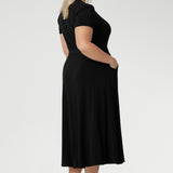 With side pockets for added practicality, this midi-length dress is an ideal choice for curvy women seeking stylish workwear. Available in sizes 8-24, the Alexis dress is the perfect plus-size wrap dress for women looking for a flattering, functional, and fashionable