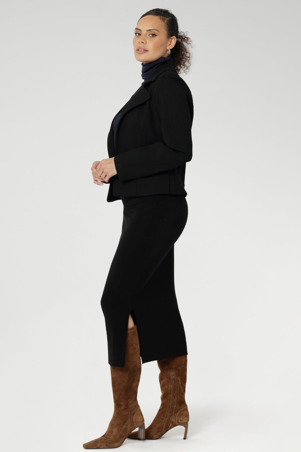 Crafted as a double-layer tube skirt, it features a soft folded waistband and a comfortable pull-on style, combining elegance with ease of wear.