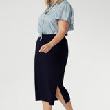 Elevate your wardrobe with the sophisticated Andi Midi Skirt in Navy, designed to keep you both work- and event-ready. Crafted from a navy dry-touch jersey fabric, this skirt offers a soft stretch for all-day comfort.