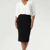 Now available in three lengths, this skirt is crafted from a black dry-touch jersey fabric with a soft stretch for ultimate comfort. Featuring a double-layer tube design, a soft folded waistband, and a convenient pull-on style, the Andi Tube Skirt offers a flattering regular length that pairs effortlessly with any wardrobe.