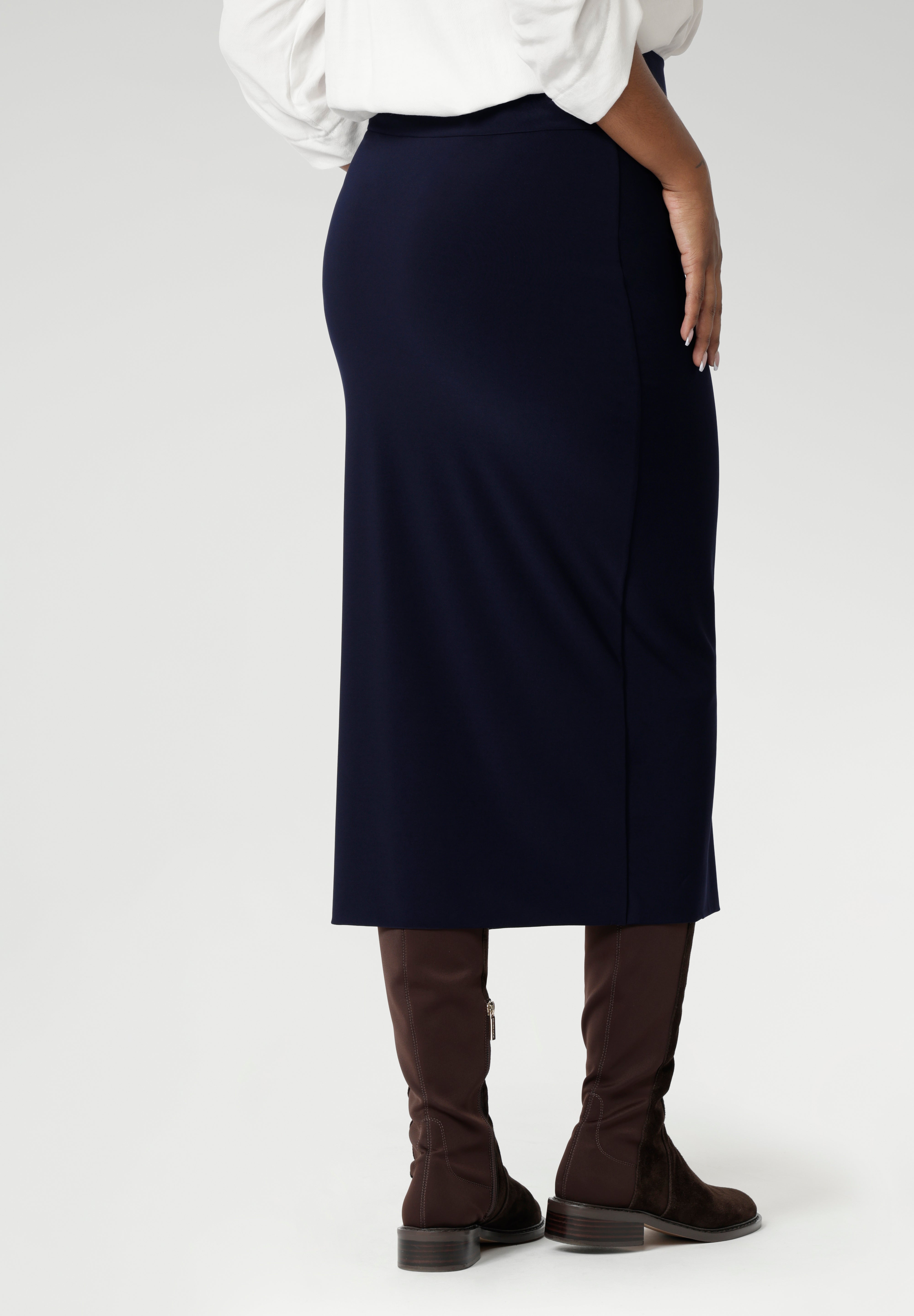 Featuring a convenient pull-on style, the Andi Midi Skirt is cut to a flattering mid-calf length, making it a versatile addition to any wardrobe. Available in sizes 8-24 and 3 different lengths.