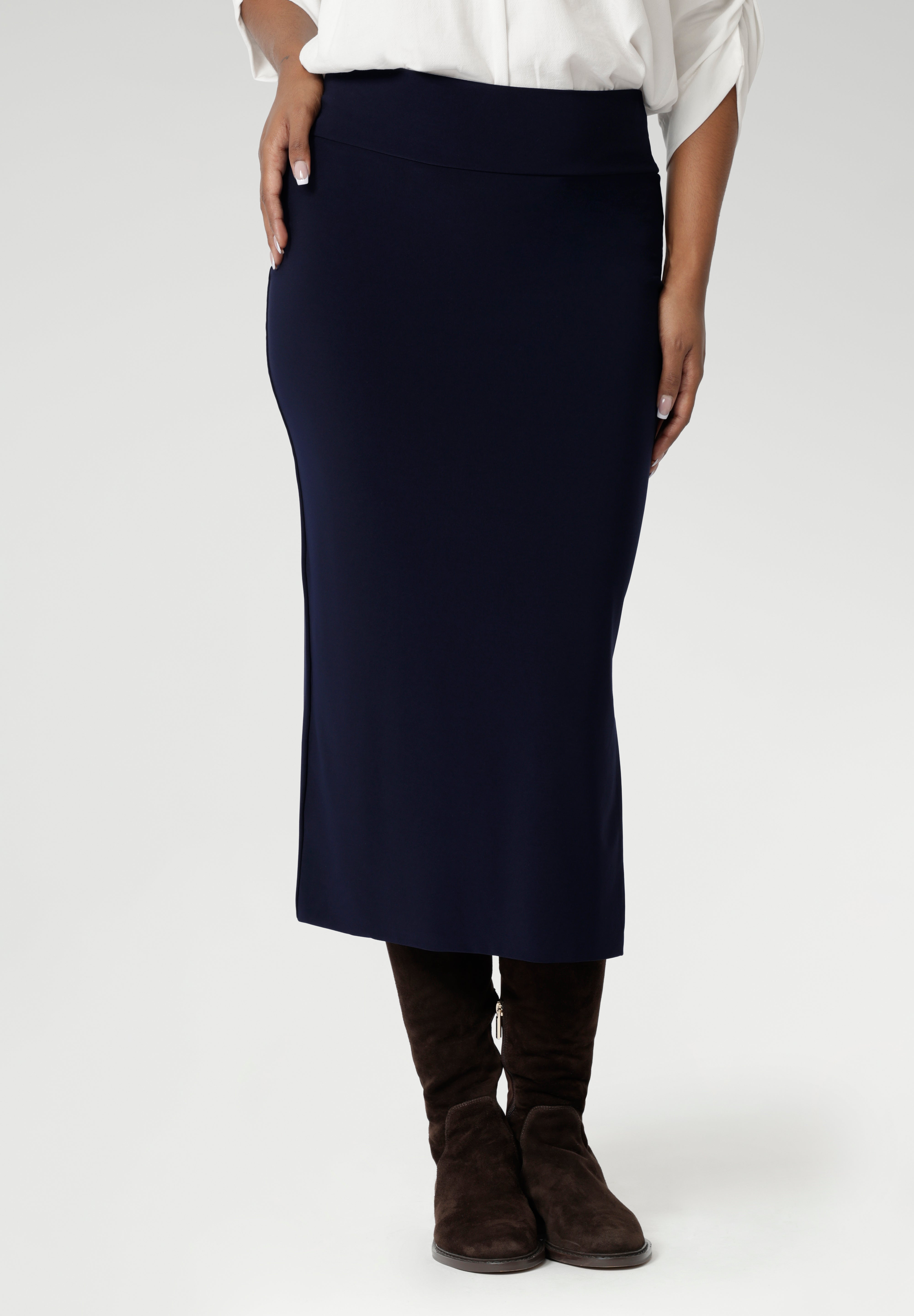 Featuring a convenient pull-on style, the Andi Midi Skirt is cut to a flattering mid-calf length, making it a versatile addition to any wardrobe. Available in sizes 8-24 and 3 different lengths.