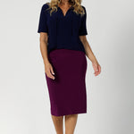 This knee-length tube skirt in a vibrant magenta is a bold and versatile wardrobe staple, crafted with care by Australian fashion brand Leina & Fleur. Featuring a double-layer design, it offers both structure and comfort. The soft, folded waistband ensures a relaxed yet secure fit, while the pull-on style makes it effortlessly easy to wear.
