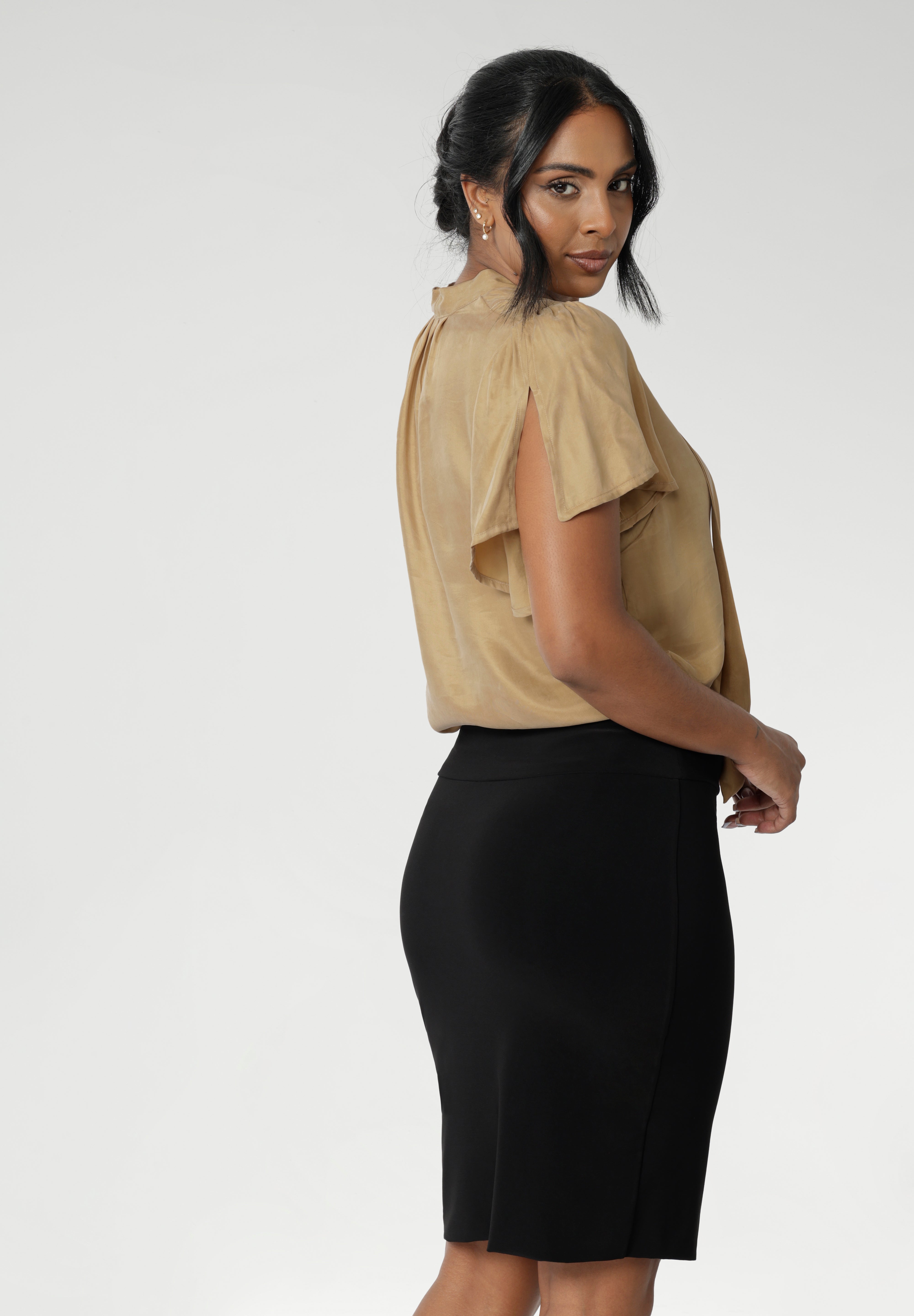 Our petite-height friendly tube skirt is a fabulous option when you want to show a bit more leg. Designed as a pull on style tube skirt featuring a soft folded waistband and double lined skirting. Proudly Made in Australia. Available in sizes 8-24 and 3 lengths.