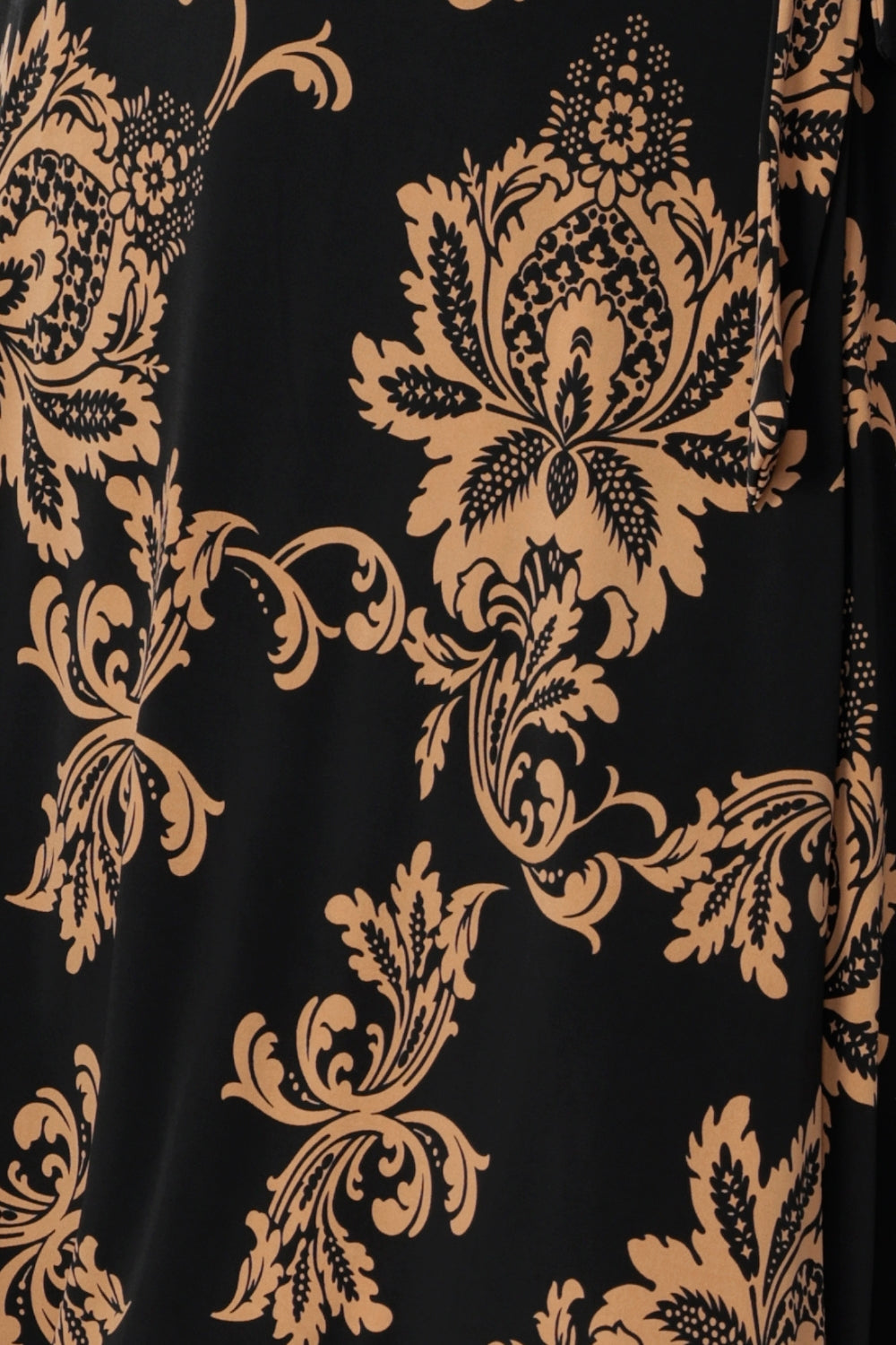 Swatch image showcasing the Aria Coffee print by Leina + Fleur, an Australian women’s clothing brand known for designing stylish, size-inclusive dresses and workwear in sizes 8 to 24. Crafted from easy-care, dry-touch jersey fabric, this print offers the perfect blend of stretch, comfort, and effortless elegance.
