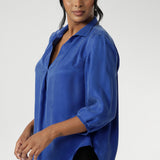 The shirttail hemline gives the option to wear it tucked in or loose, offering flexibility for different looks throughout the day. Easy to care for and made in Australia for women in Australia and New Zealand, the Arley Shirt is available in inclusive sizes 8 to 24 and pairs effortlessly with tailored trousers or pencil skirts for a refined, corporate-ready ensemble with a modern edge.