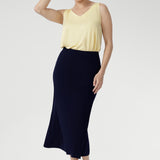 The Asher Skirt is crafted from our signature dry-touch stretch jersey, offering a comfortable, flexible fit that flatters every shape. With an easy pull-on elastic waist and a refined A-line silhouette, it’s the perfect skirt for effortless styling from work to weekend. Proudly designed and made in Australia, this is a wardrobe essential for modern women on the move.
