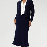 The pull-on style includes internal elastic at the waist for added comfort and ease, while darts at the back provide subtle shaping. With its A-line cut and unlined finish, the Asher Skirt is both versatile and sophisticated, making it a go-to piece for any wardrobe.