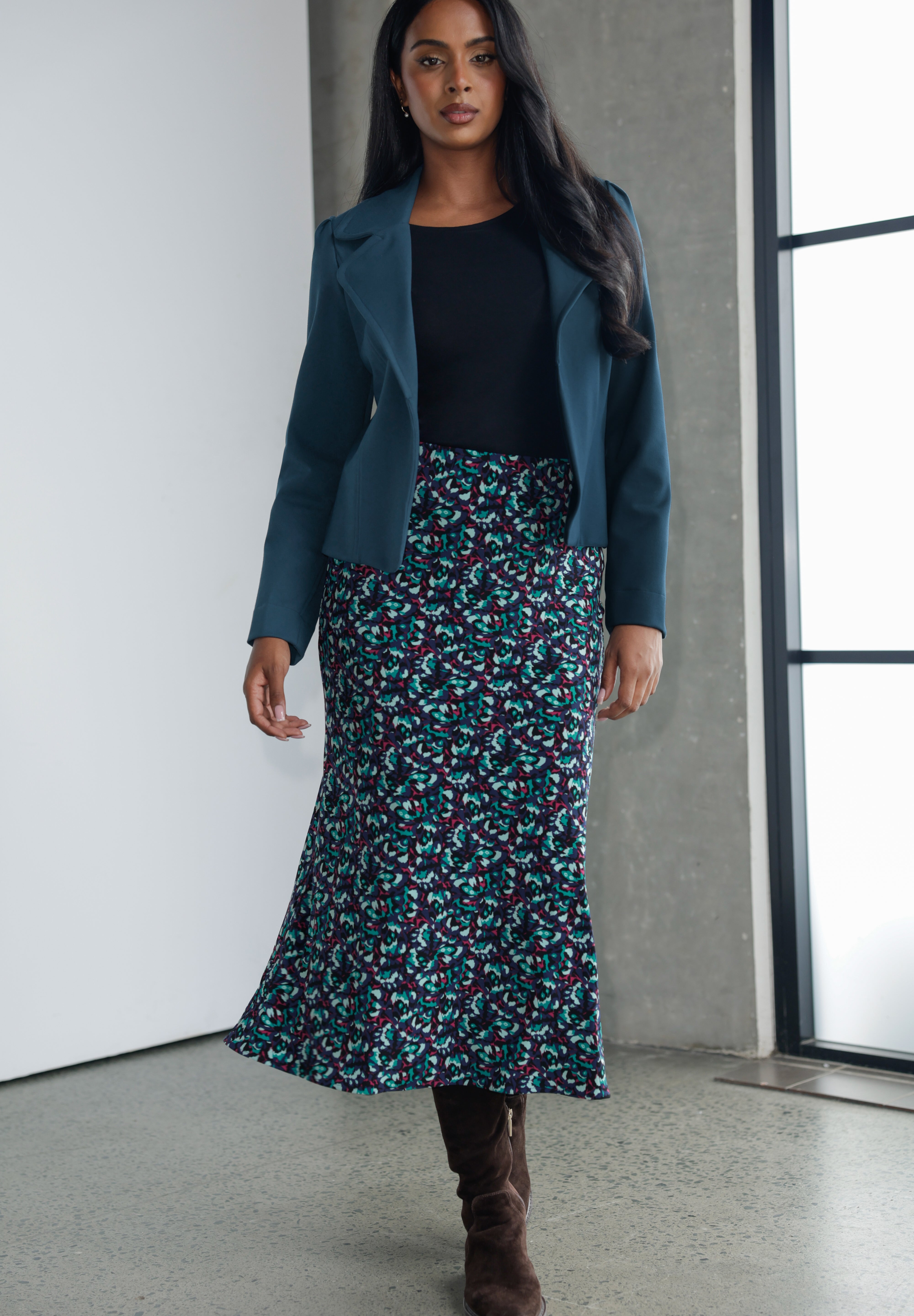 The Asher Skirt is the kind of wardrobe piece that effortlessly blends comfort with polish, making it just as suited to relaxed weekends as it is to more elevated moments. Designed with travel in mind, this midi-length skirt glides easily over the body thanks to its bias cut, offering a fluid drape that flatters without clinging.