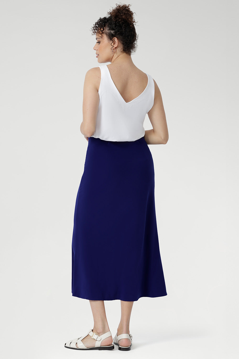 The Asher Skirt in Cobalt brings effortless sophistication to your everyday style. Crafted from Australian-made dry-touch stretch jersey.