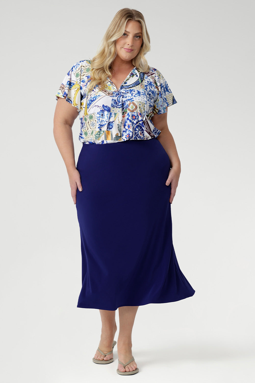 The Asher Skirt in Cobalt combines comfort, stretch, and style in one timeless piece. Made from our signature dry-touch stretch jersey, this A-line pull-on skirt feels soft yet structured, designed to flatter every figure. With its easy elastic waist and versatile cobalt tone, it’s the skirt you’ll reach for from desk to dinner and every moment in between.