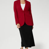 Bright red coloured blazer, a textured scuba crepe. Red work blazer is worn with black skirt and white t-shirt. Curved hemline and front pockets. This blazer is Made in Australia for petite women in sizes 8 - 24.