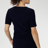 Australian-made women's top. Features short fitted sleeves and a square neckline. Stretchy fabric is perfect for weekend casual and everyday work wear. Available in sizes 8-24. Women's Navy Jersey Top.
