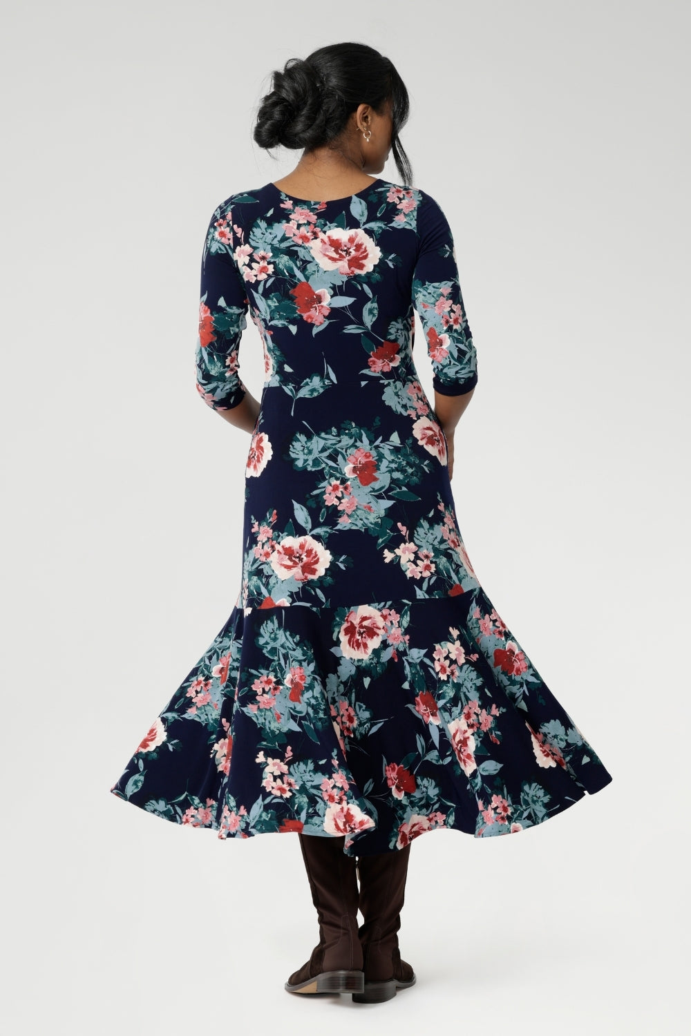 Thoughtfully designed with practical side pockets, a skirt lining, and a double-layer bodice, this floral dress is as functional as it is stylish. Now available in both regular and petite sizing from size 8 to 24, the Bettina Reversible Dress is made to fit and flatter every figure.