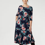The 3/4 length sleeves offer coverage with a touch of sophistication, while the flowing maxi skirt is finished with a ruffle hemline for added movement and flair. Thoughtfully designed with practical side pockets, a skirt lining, and a double-layer bodice and petite length skirt for the shorter women.