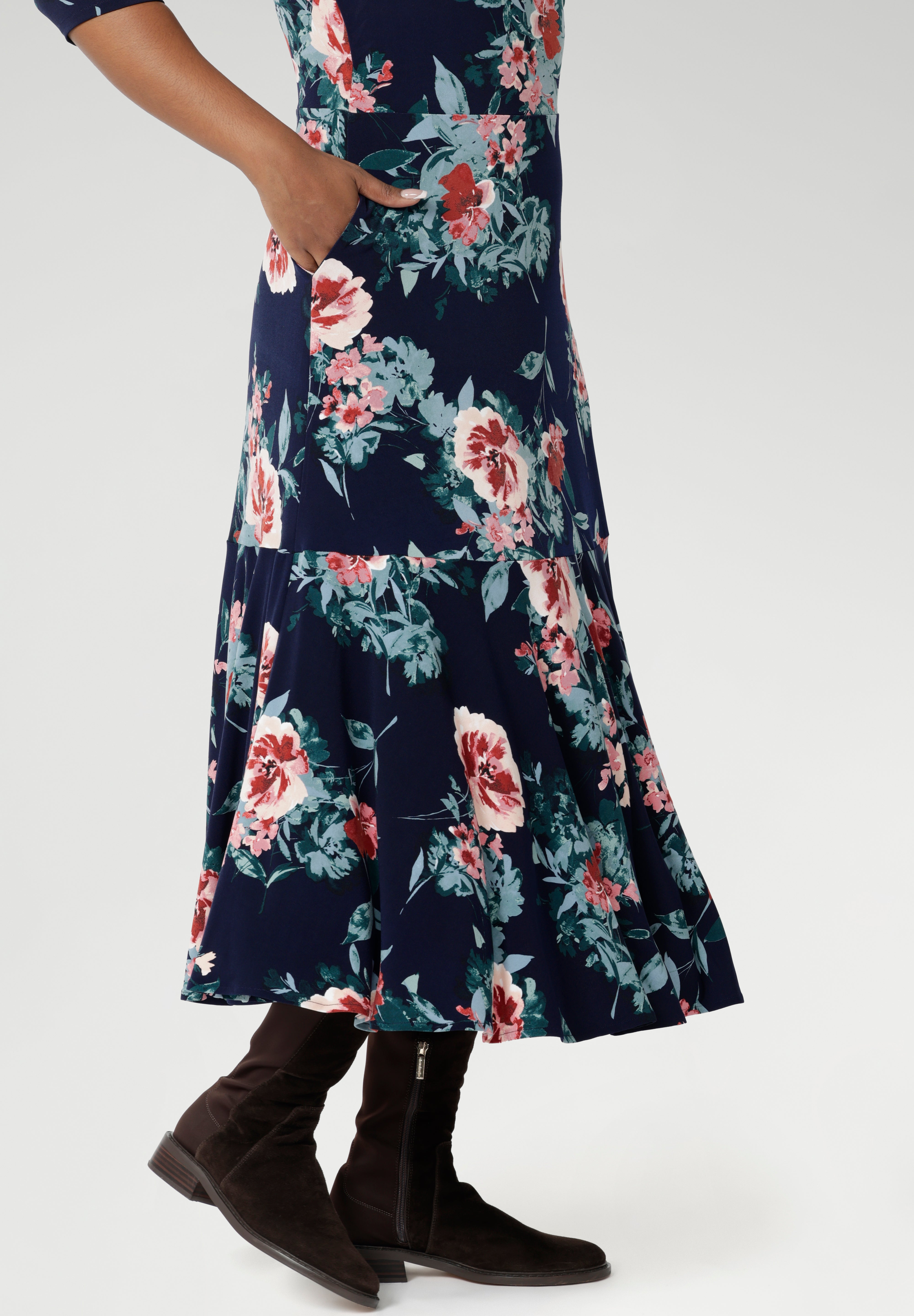 With a flowing maxi skirt is finished with a ruffle hemline for added movement and flair. Bettina has been designed with practical side pockets, a skirt lining, and a double-layer bodice, this floral dress is as functional as it is stylish. Now available in both regular and petite sizing from size 8 to 24, the Bettina Reversible Dress is made to fit and flatter every figure.