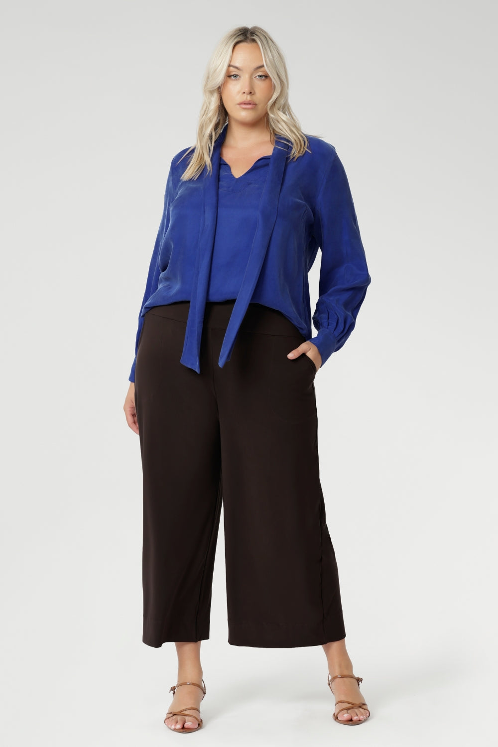 Plus size woman wears a pairBradley Culotte Pants for a comfortable soft suiting combination. Available in sizes 8-24 and in 2 lengths.