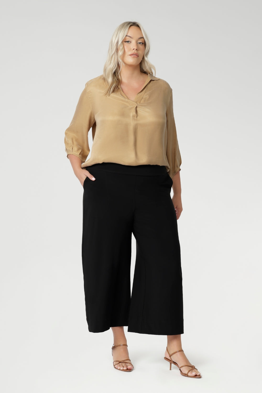 Wide leg black culotte pants are made from dry touch jersey. Worn by size 18 woman - shop online at Australian women's clothing brand Leina & Fleur in sizes 8-24, with regular & short lengths available.