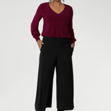 Wide leg black culotte pants worn with a clay coloured summer cami and light weight blazer made from dry touch jersey. Worn by size 12 woman - shop online at Australian women's clothing brand Leina & Fleur in sizes 8-24, with regular & short lengths available.