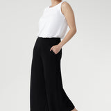 Double-layer waistband, side-pockets, and cropped length, they pair perfectly with a shirt for an elevated outfit or with plain top for a more relaxed look.