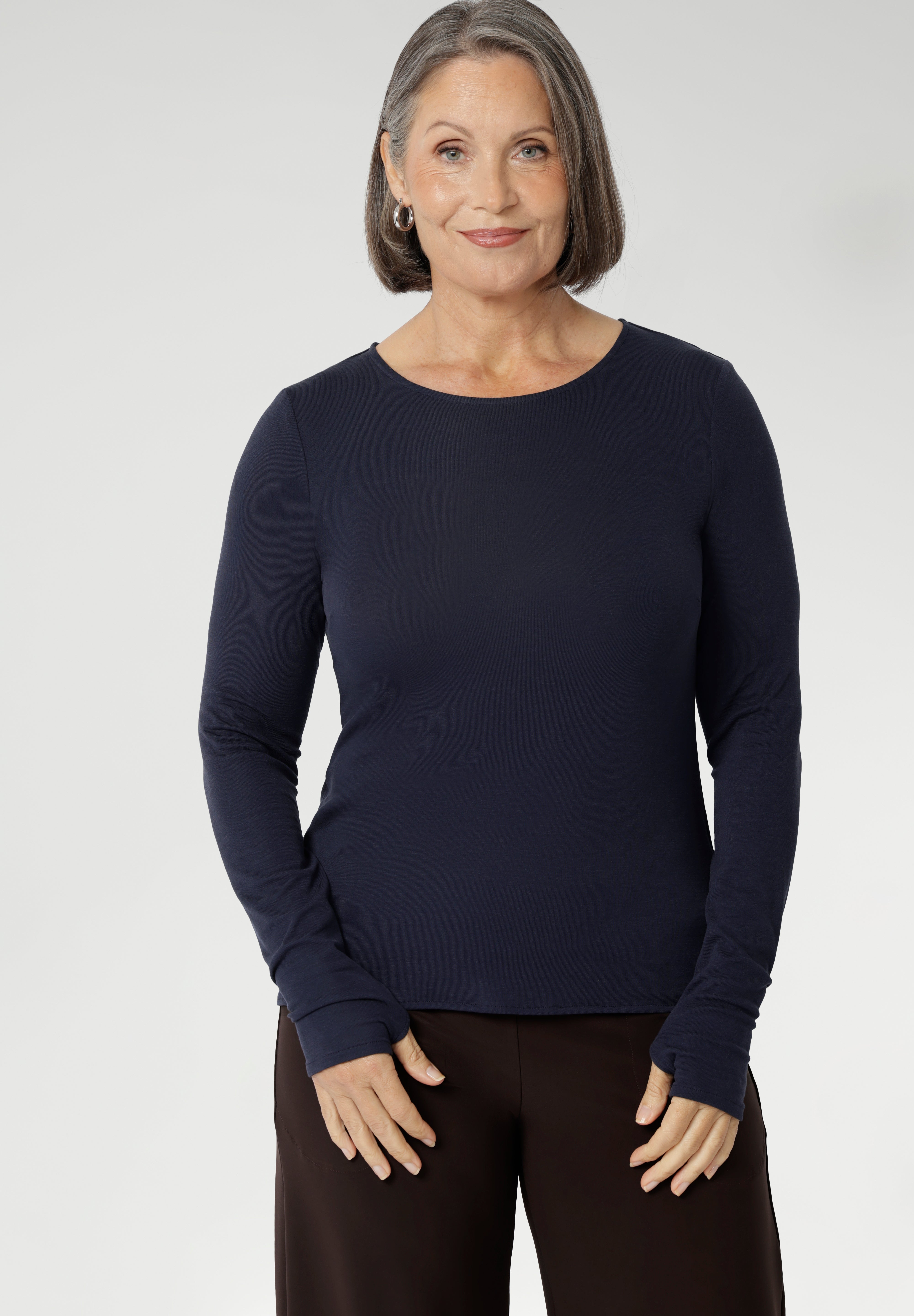 Designed with comfort in mind, offering generous stretch and a smooth, breathable feel. Australian Made fabric has been used to craft a collection of Tencel Wool long sleeve tops with the choice of a boat neck and turtle neck lines.