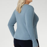 Stay effortlessly stylish through the cooler months with this luxuriously soft knit top, crafted from a premium Tencel wool blend. Designed for comfort and versatility, it features a flattering close-to-body fit that moves with you, thanks to its generous stretch and breathable finish.