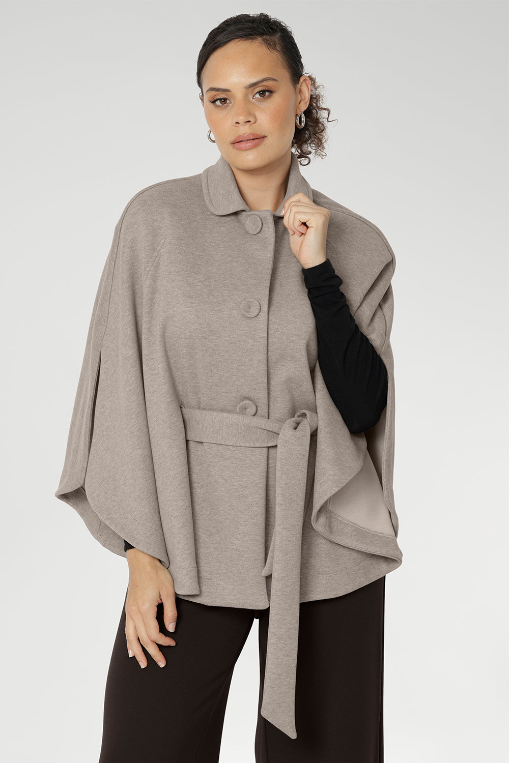 Wrap yourself in luxurious comfort this winter with our beautifully crafted women's cape, made in Australia by Leina + Fleur. Expertly tailored from a premium blend of Polyester, Viscose, Tencel, Silk, and Wool, this cape delivers a sophisticated balance of softness, warmth, and breathability — perfect for layering through the cooler seasons.
