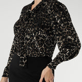 The striking animal burnout print is set against a soft, stretchy black jersey base that offers comfort without compromising on style.