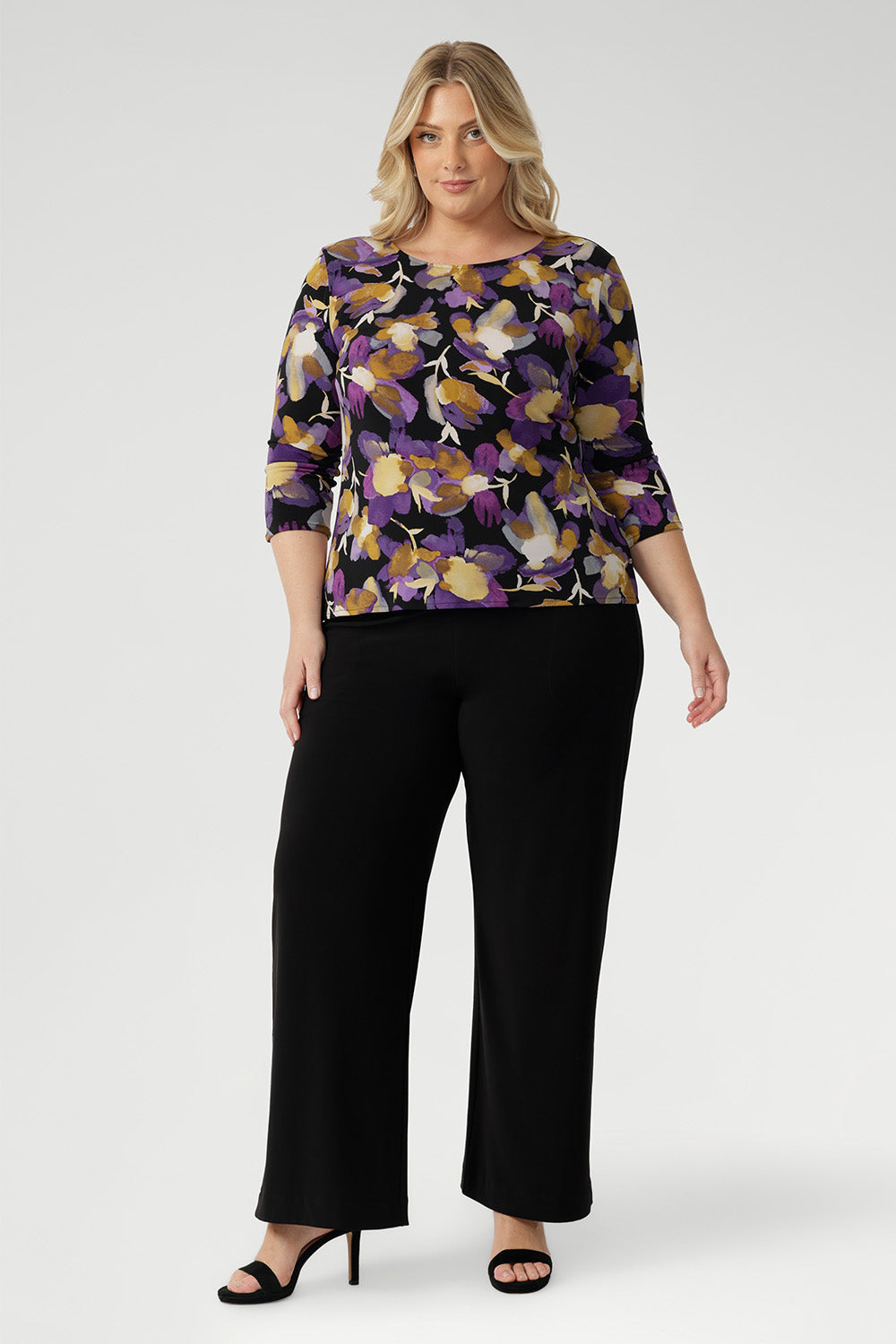 Elevate your everyday wardrobe with the effortlessly stylish Collins Top—an essential layering piece designed for versatility and comfort. Crafted from premium dry-touch jersey fabric with a soft stretch, this flattering top offers a chic boat neckline, ¾ sleeves, and a soft, dipped hemline that creates a beautifully balanced silhouette.