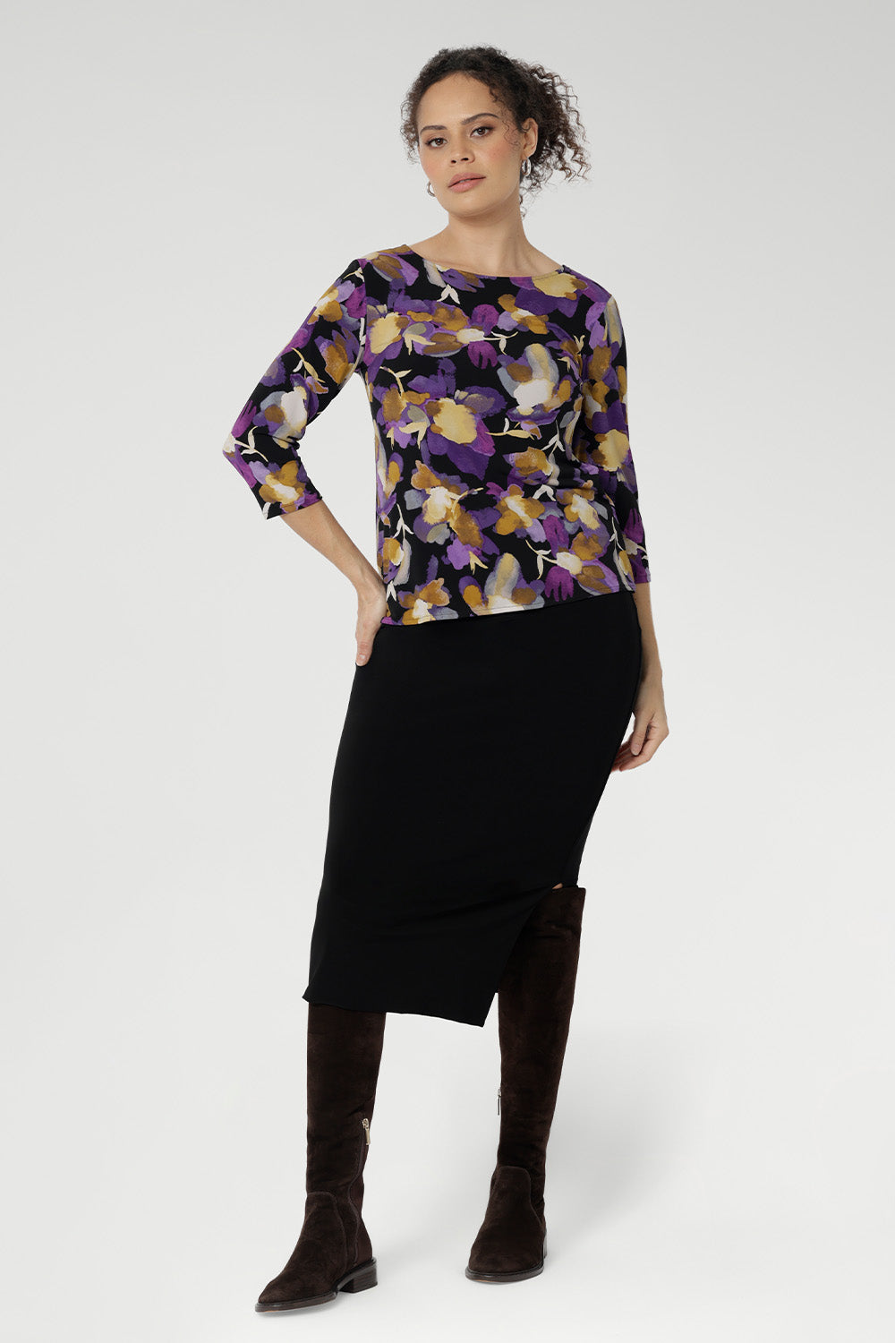 Designed to contour with a close-to-body fit, the Collins Top features thoughtful bust darts and a longer curved hem at the back for extra coverage and a polished finish. Available in inclusive sizes 8–24 and proudly designed and made in Australia.