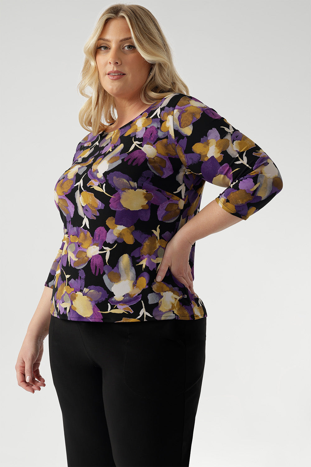 Crafted from premium dry-touch jersey fabric with a soft stretch, this flattering top offers a chic boat neckline, ¾ sleeves, and a soft, dipped hemline that creates a beautifully balanced silhouette. Designed to contour with a close-to-body fit, the Collins Top features thoughtful bust darts and a longer curved hem at the back for extra coverage and a polished finish.