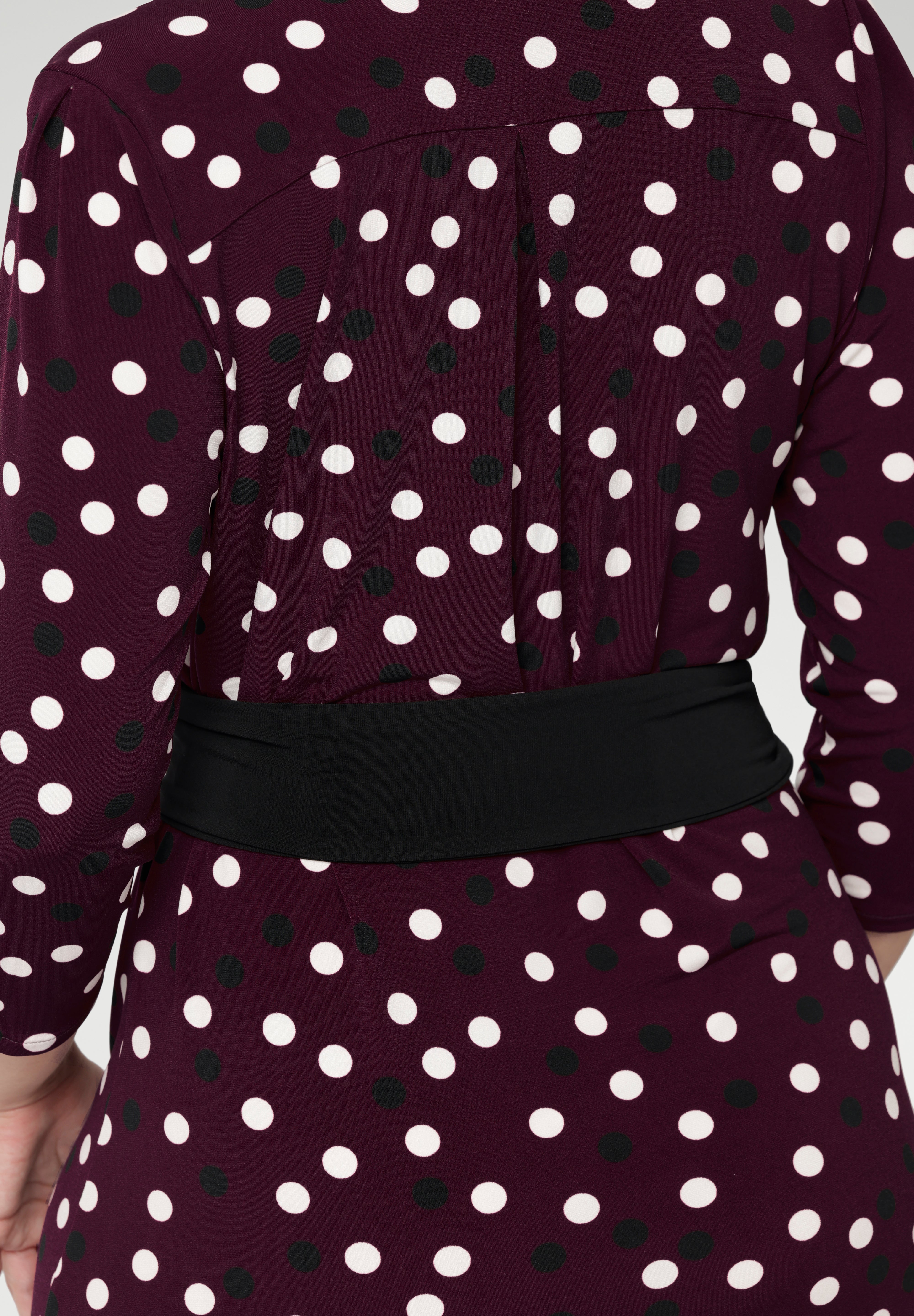 Proudly made in Australia, it’s the perfect finishing touch to elevate your work-to-weekend wardrobe with ease and sophistication. Burgundy spotted dress for event dressing and office elevating outfits.