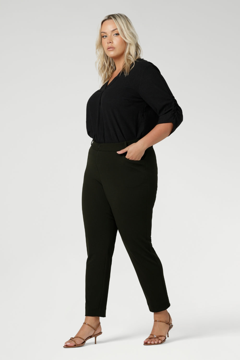 Whether paired with a simple blouse or a structured blazer, these pants offer both comfort and style for the modern woman. Available in sizes 8-24.