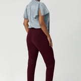 The tapered legs give the pants a modern, flattering silhouette, and the ankle-length design offers a chic, versatile look. Available in sizes 8-24 and in different colours and styles.