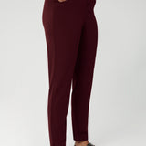 Women's workwear pants are tailored with angled front pockets for practicality, while the back darts enhance the shape and structure. Made from easy care and stretchy scuba crepe fabric in sizes 8-24.
