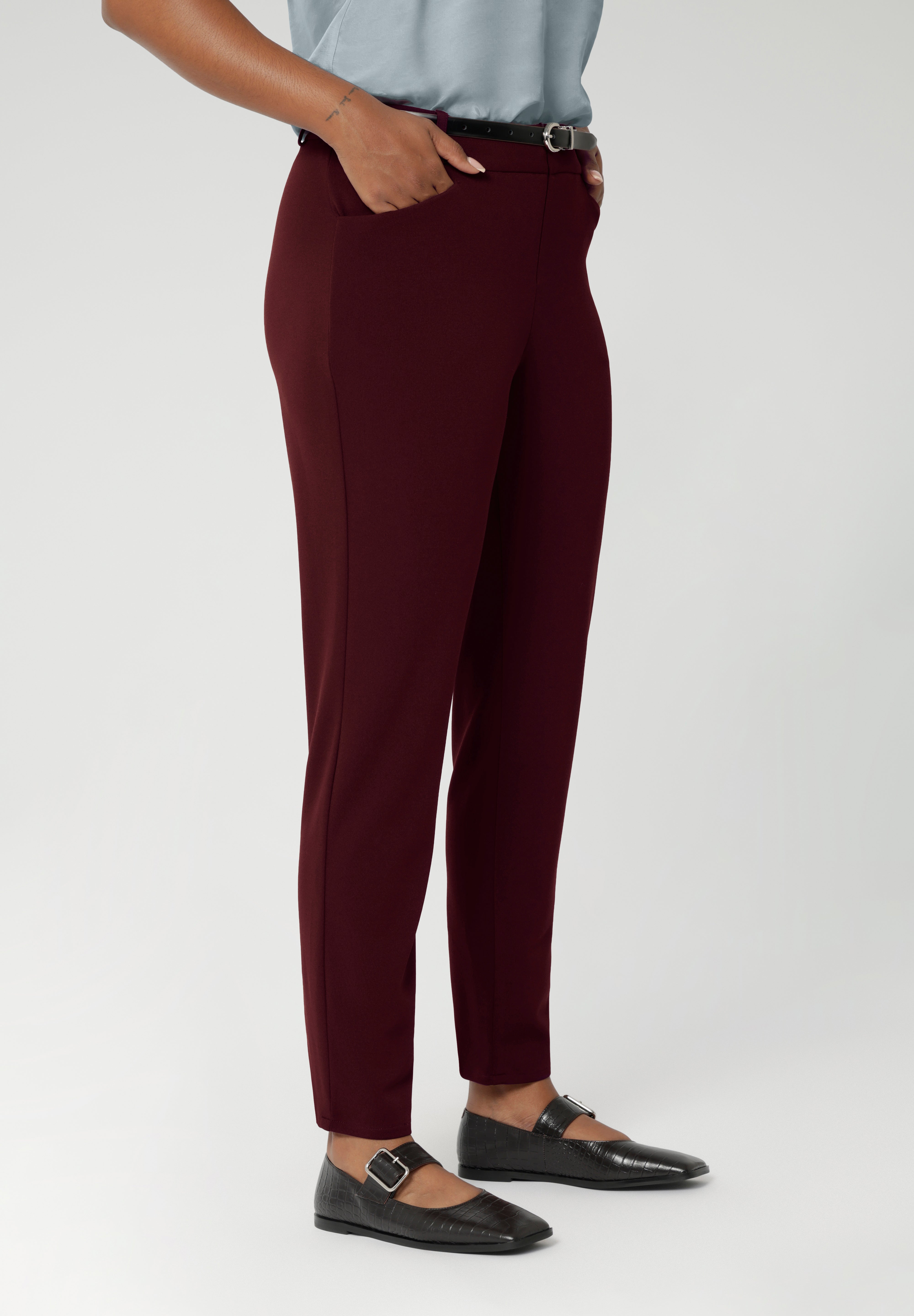 Women's workwear pants are tailored with angled front pockets for practicality, while the back darts enhance the shape and structure. Made from easy care and stretchy scuba crepe fabric in sizes 8-24.