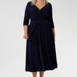 Ideal for both office wear and weekend styling, this fabric belt offers effortless versatility, taking you seamlessly from desk to dinner and everything in between. Plus size model wears D-ring belt in Navy over Bettina Reversible Dress in Navy creating a faux tie dress.