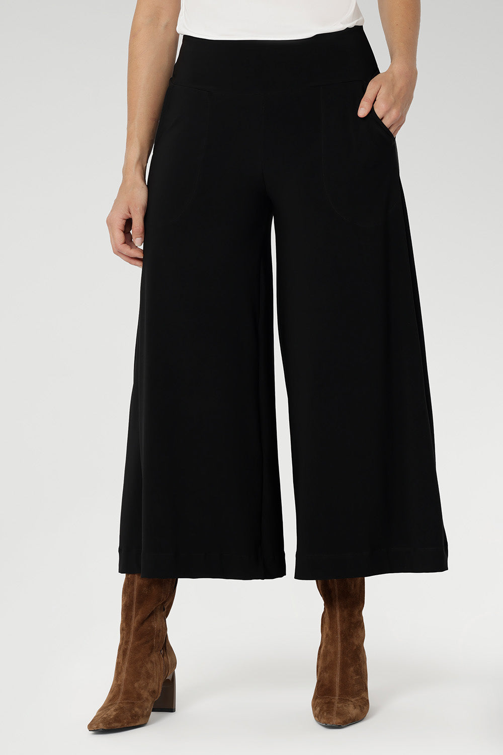 Black pants have a smooth waistband, side pockets and are pull-on pants made in stretch jersey. Made in Australia, the pants are size inclusive in sizes 8 - 24.