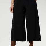 Black pants have a smooth waistband, side pockets and are pull-on pants made in stretch jersey. Made in Australia, the pants are size inclusive in sizes 8 - 24.