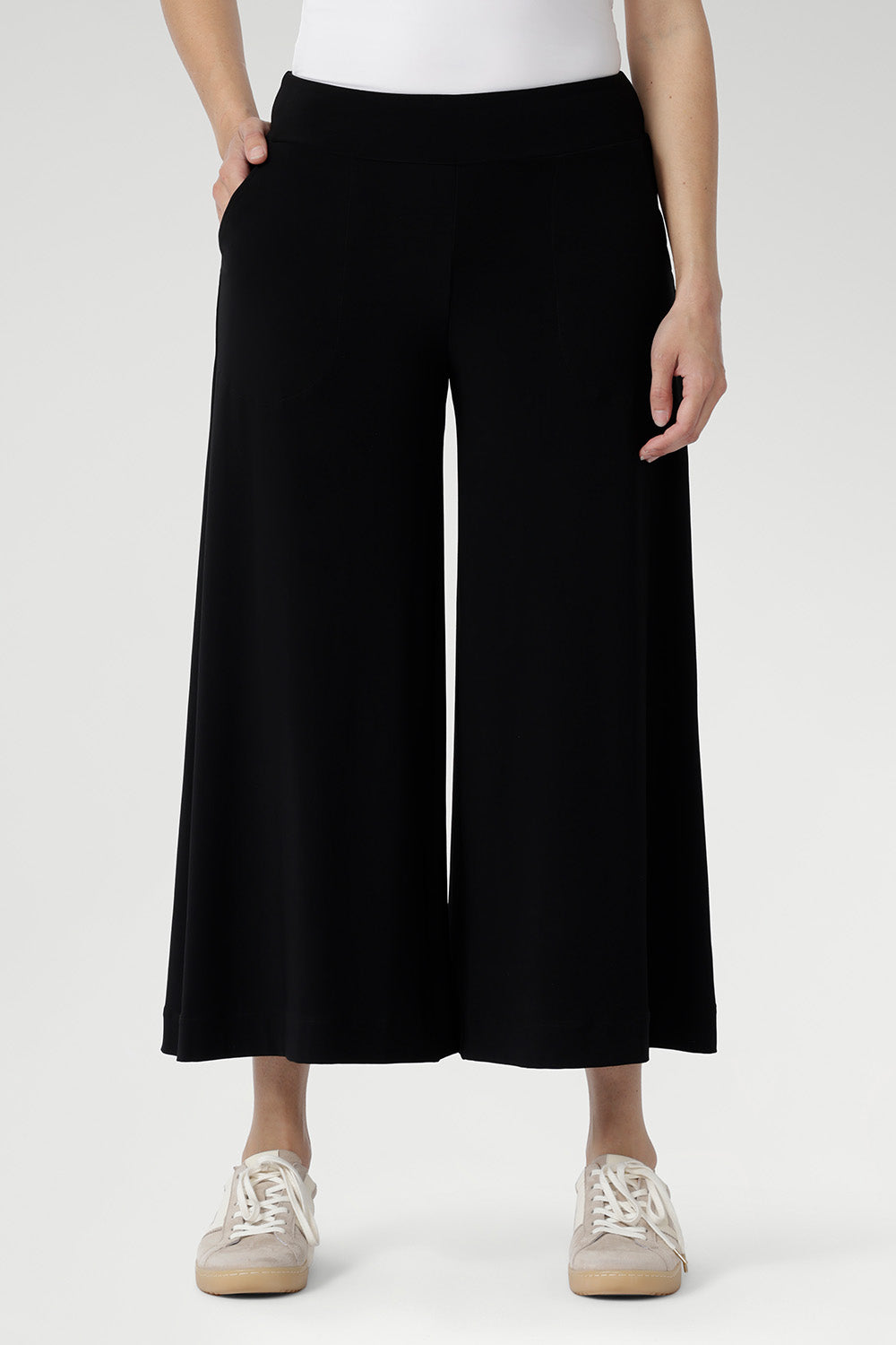 Black pants have a smooth waistband, side pockets and are pull-on pants made in stretch jersey. Made in Australia, the pants are size inclusive in sizes 8 - 24.
