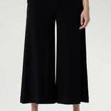 Black pants have a smooth waistband, side pockets and are pull-on pants made in stretch jersey. Made in Australia, the pants are size inclusive in sizes 8 - 24.