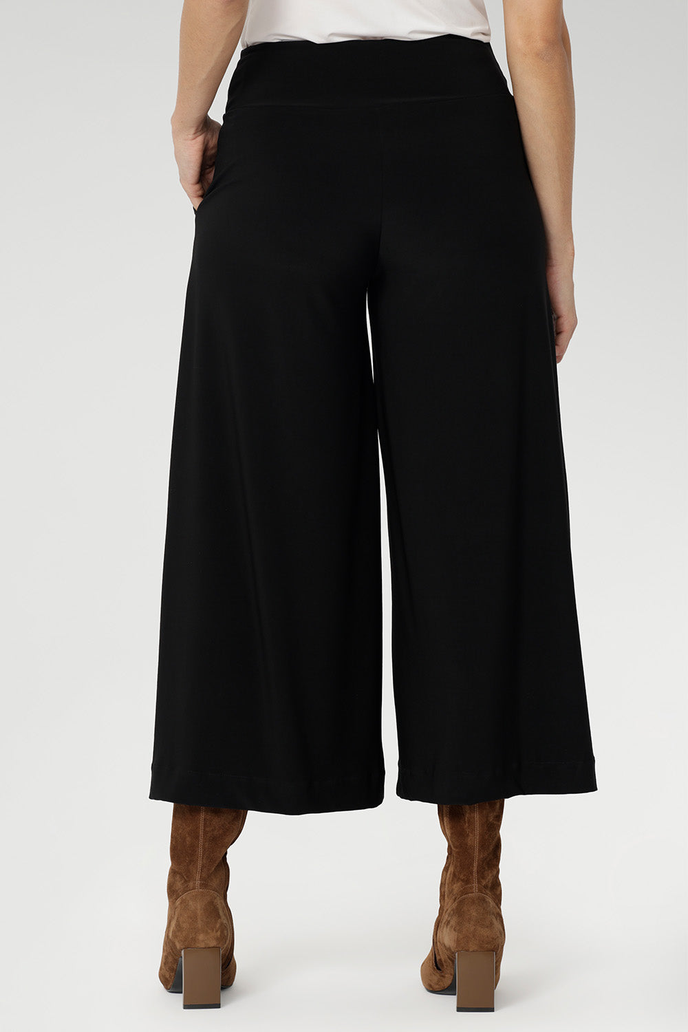 Women's black work pants have a smooth waistband, side pockets and are pull-on pants made in stretch jersey. Made in Australia, the pants are size inclusive in sizes 8 - 24.