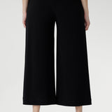 Black pants have a smooth waistband, side pockets and are pull-on pants made in stretch jersey. Made in Australia, the pants are size inclusive in sizes 8 - 24.