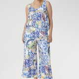 Designed with V-necklines front and back, wide straps for perfect bra coverage, and a shirttail hem, it’s finished with a Sicilian-inspired mosaic print. A versatile piece that brings effortless polish from work to weekend.